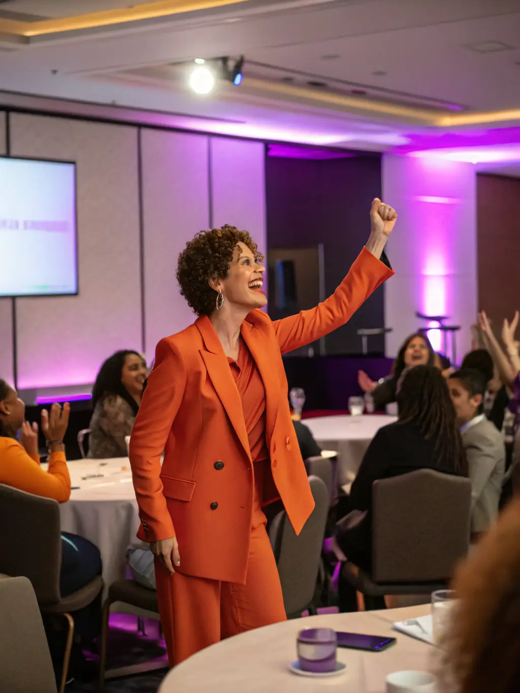 A woman entrepreneur confidently leading a team meeting, demonstrating strong leadership skills and inspiring her colleagues.